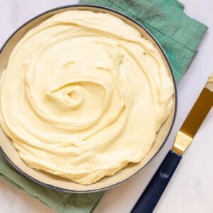no bake cheesecake in a bowl with offset spatula