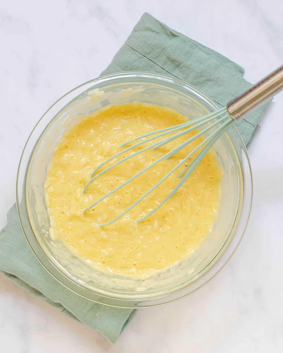 rice pudding tempered in a bowl with eggs