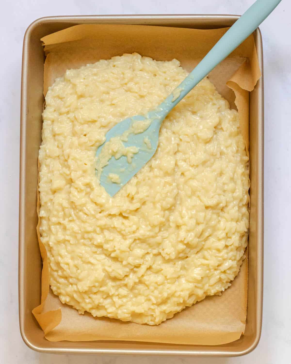 rice pudding spread into a large baking pan 