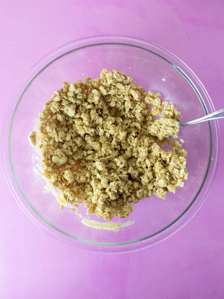 Gluten Free Raspberry Bars with Almond Flour crumble topping in a bowl