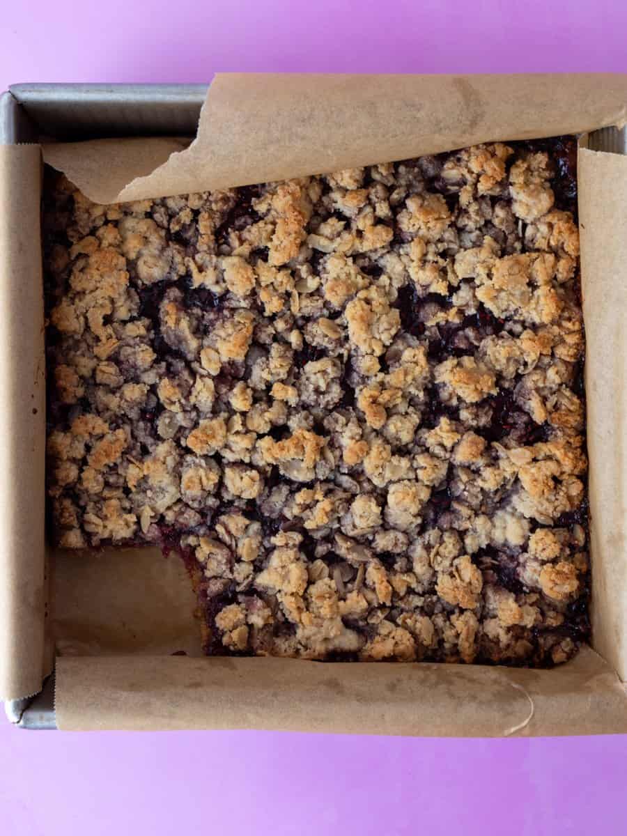 baked gluten free raspberry bars in the pan