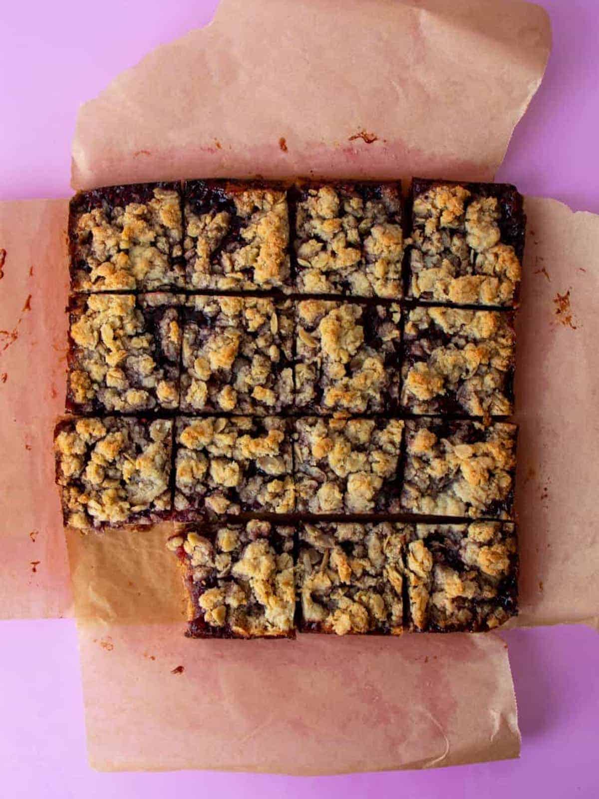 gluten free raspberry bars cut into 12 squares