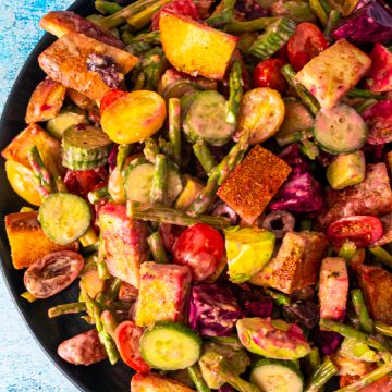 Gluten Free Greek-Style Panzanella Salad on serving dish