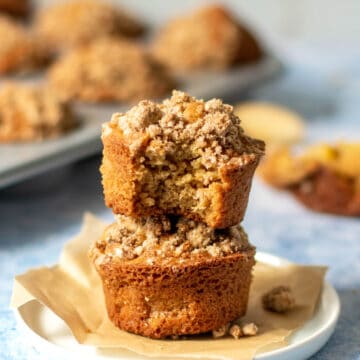 gluten free apple muffins stacked with bite taken out