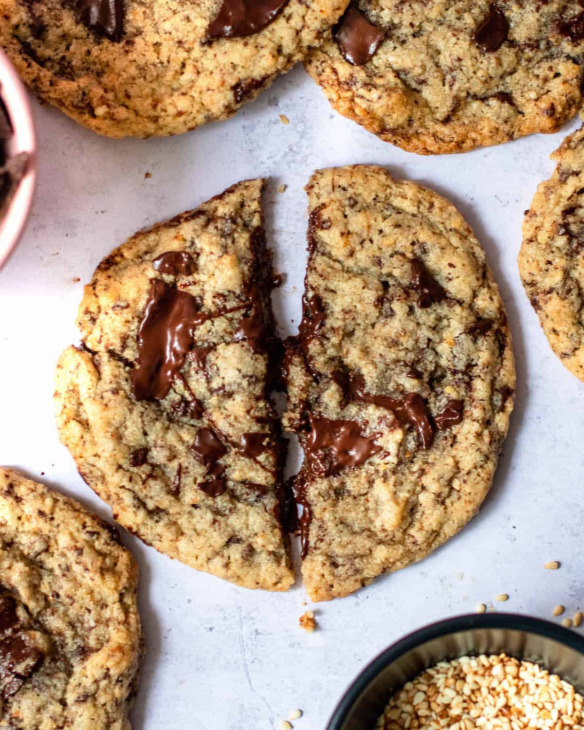 sesame chocolate chip cookie broken in half