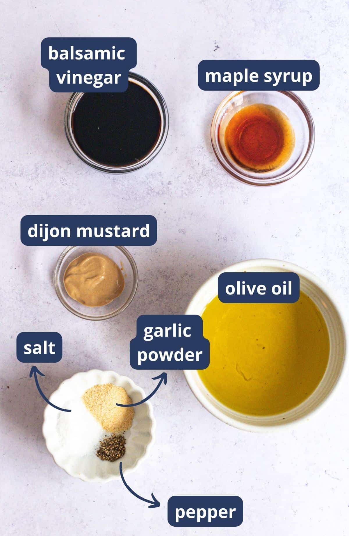 balsamic dressing ingredients in small bowls