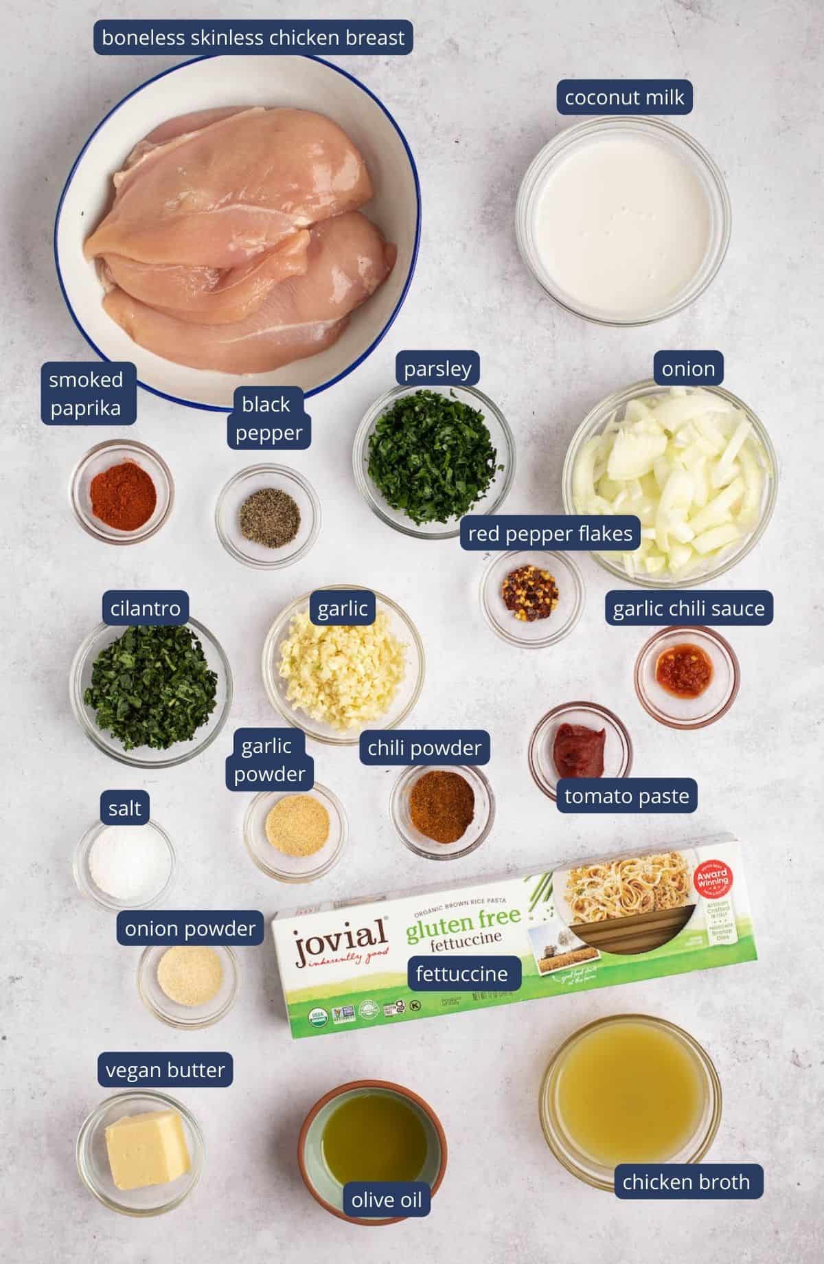 ingredients for spicy chicken pasta with text overlay