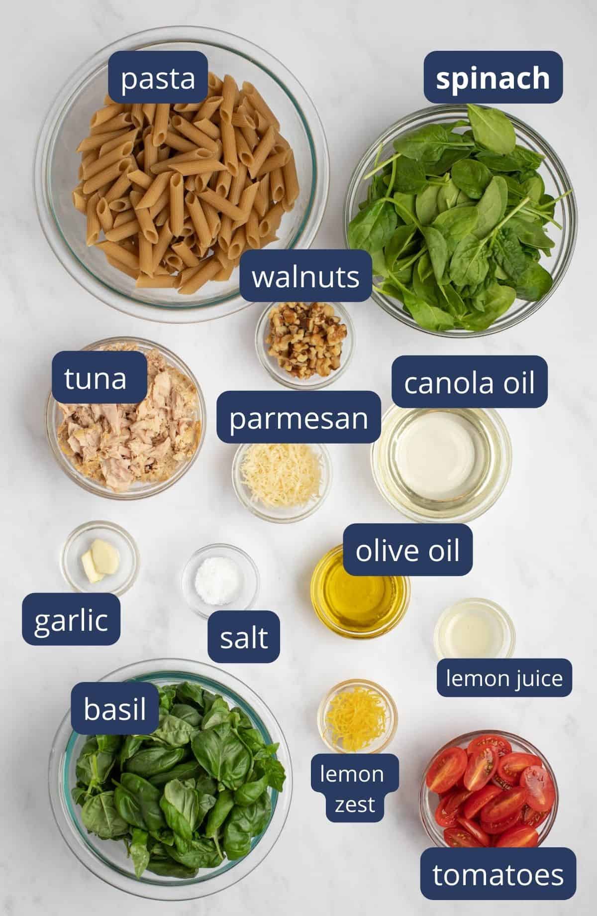 ingredients for tuna pesto pasta with text overlay