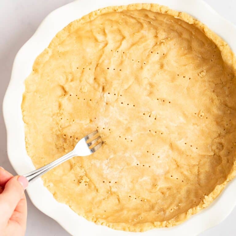 gluten free coconut oil pie crust in a white pan
