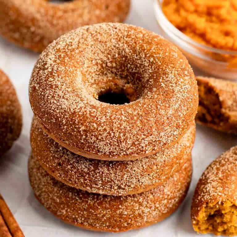 three healthy pumpkin cake donuts stacked