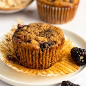 Banana Blackberry Oatmeal Muffin on a white small plate