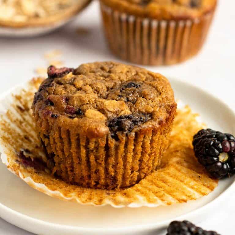 Banana Blackberry Oatmeal Muffin on a white small plate