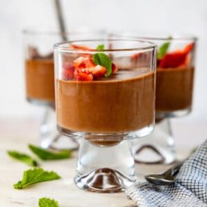 3 photos of high protein chocolate mousse with strawberry topping