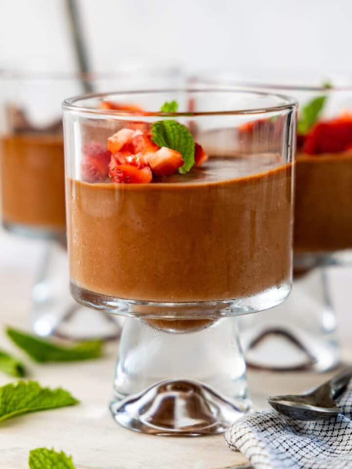3 photos of high protein chocolate mousse with strawberry topping