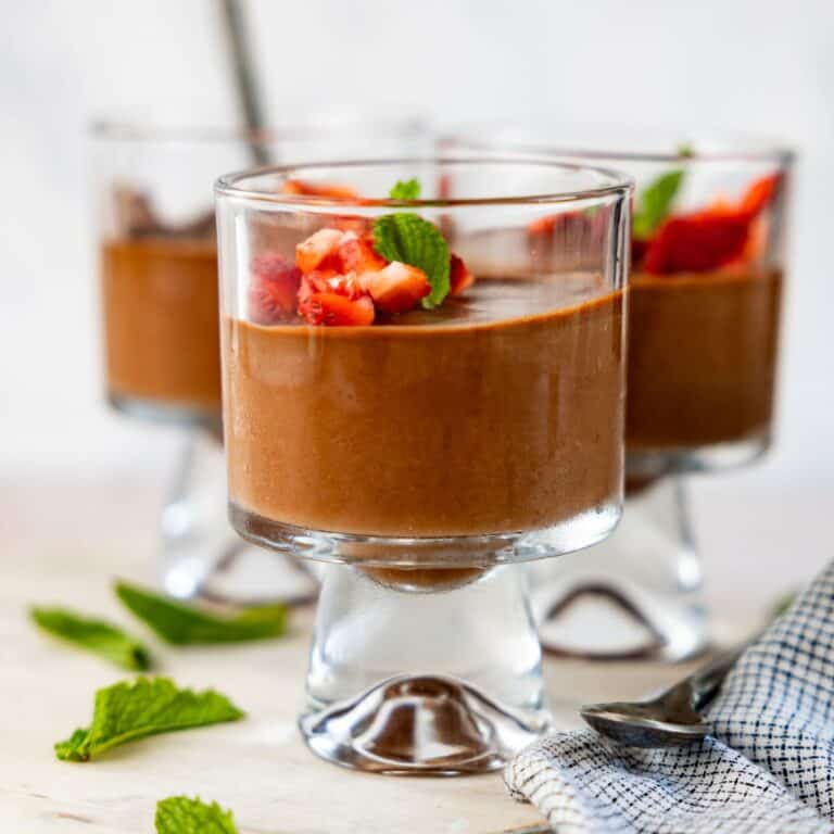 3 photos of high protein chocolate mousse with strawberry topping