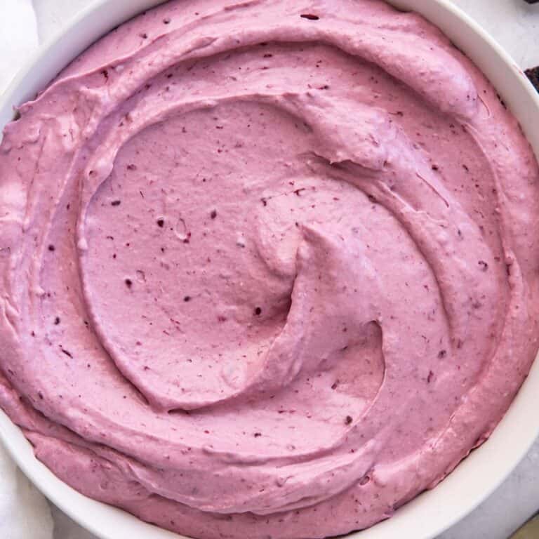 Blackberry Cheesecake Filling for Cake in a ceramic bowl
