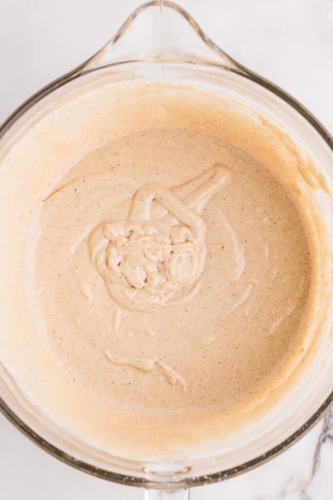 thick oat flour pancake batter in a bowl after resting for 5 minutes